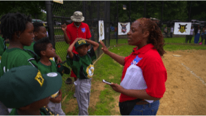 Officer Angela Wormley is a volunteer coach for the Englewood Police  Youth Baseball League. NBC News